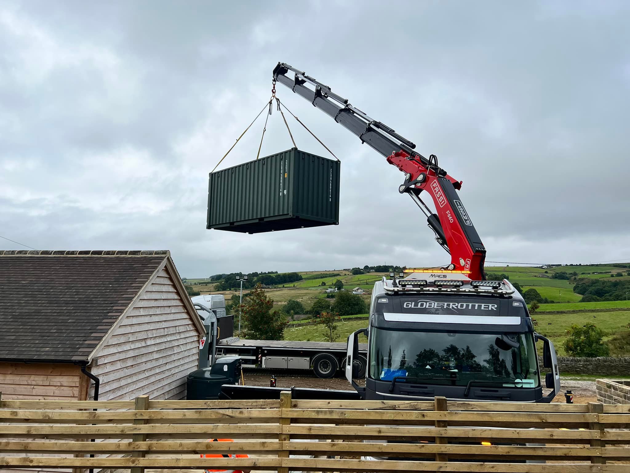 FASSI crane lifting containers